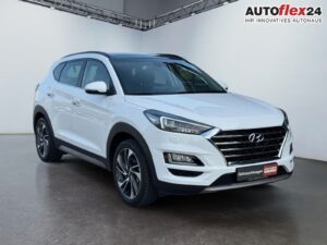 HYUNDAI Tucson 1.6 Passion + 4WD  AT Pan 360° AHK 4xS... Bild 1